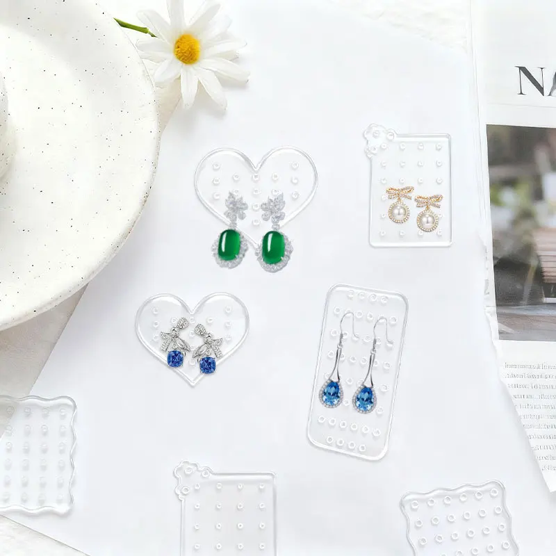 Стеллаж для хранения сережек, легкая подставка для ювелирных изделий, органайзер для сережек, карты, современная акриловая демонстрационная карточка для сережек для рынков
Стеллаж для хранения сережек, легкая подставка для ювелирных изделий, органайзер для сережек, карты, современная акриловая демонстрационная карточка для сережек для рынков