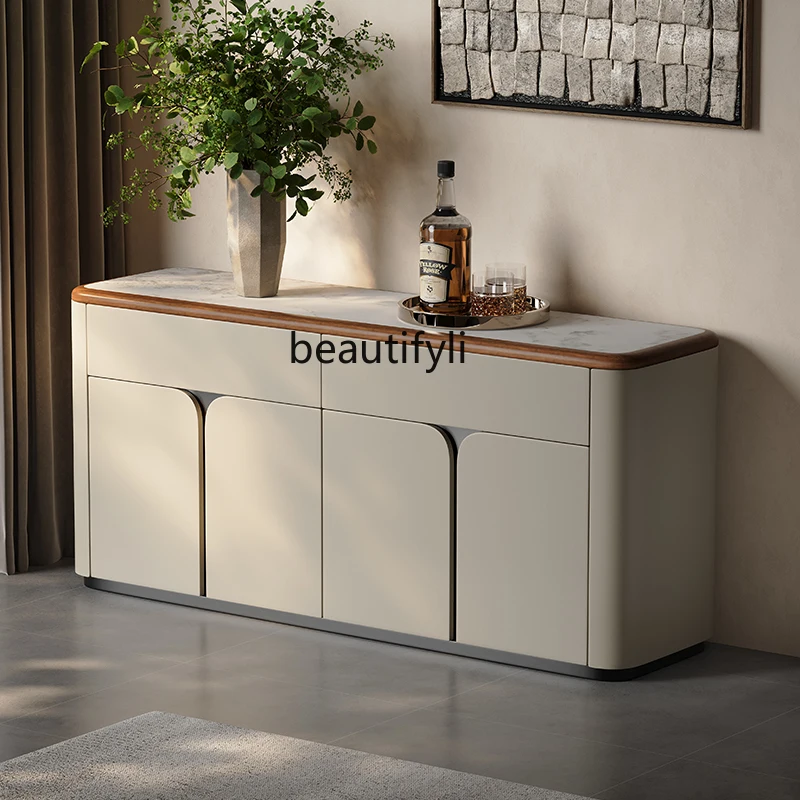 Minimalist light luxury dining side cabinet floor-to-ceiling storage leather veneer solid wood high-end sense
Minimalist light luxury dining side cabinet floor-to-ceiling storage leather veneer solid wood high-end sense