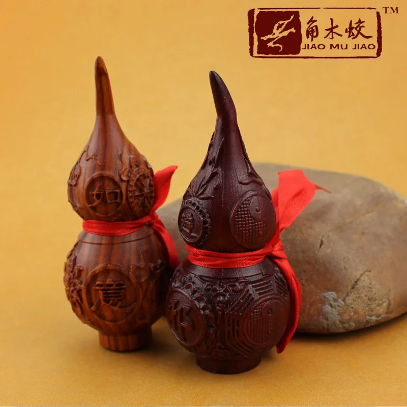 Изысканная резная тыква из красного сандалового дерева для украшения дома, изготовленная компанией Wen Wang Chong Dao Tang.
Изысканная резная тыква из красного сандалового дерева для украшения дома, изготовленная компанией Wen Wang Chong Dao Tang.