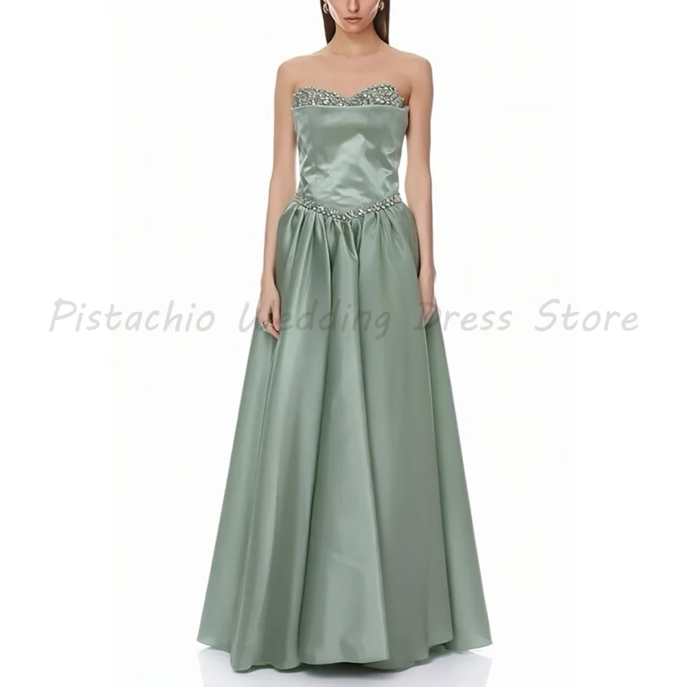 Strapless Sage Green Satin Ball Gown Crystal Beaded Sweetheart Neckline Long Formal Evening Dress Prom Party Gown
Strapless Sage Green Satin Ball Gown Crystal Beaded Sweetheart Neckline Long Formal Evening Dress Prom Party Gown