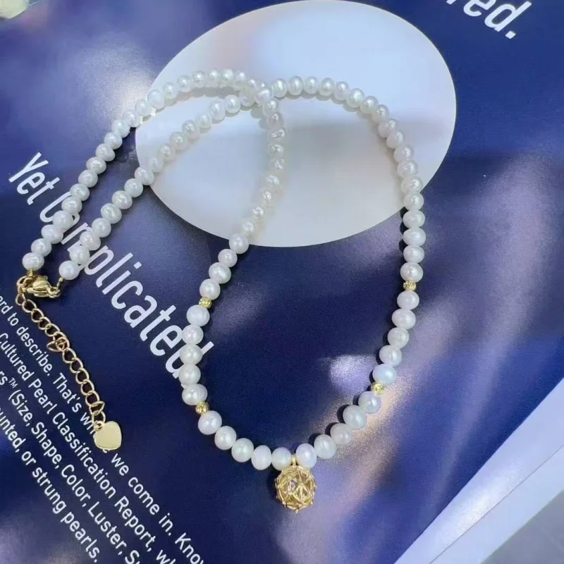 Little Golden Bean Freshwater Pearl Necklace for Women, Clavicle Chain, Niche Design, Simple and Fashionable Choker, Small Rice
Little Golden Bean Freshwater Pearl Necklace for Women, Clavicle Chain, Niche Design, Simple and Fashionable Choker, Small Rice