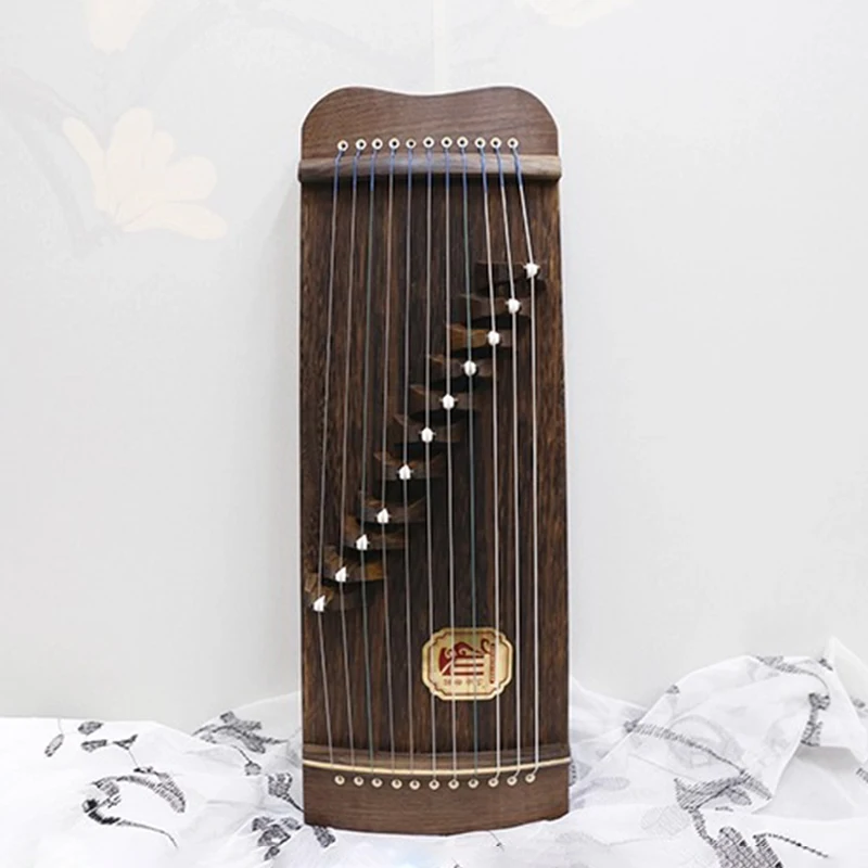 50CM Guzheng 11 Strings Mini Children Guzheng Chinese Traditional String Musical Instrument Adult Portable Playing Guzhengs
50CM Guzheng 11 Strings Mini Children Guzheng Chinese Traditional String Musical Instrument Adult Portable Playing Guzhengs