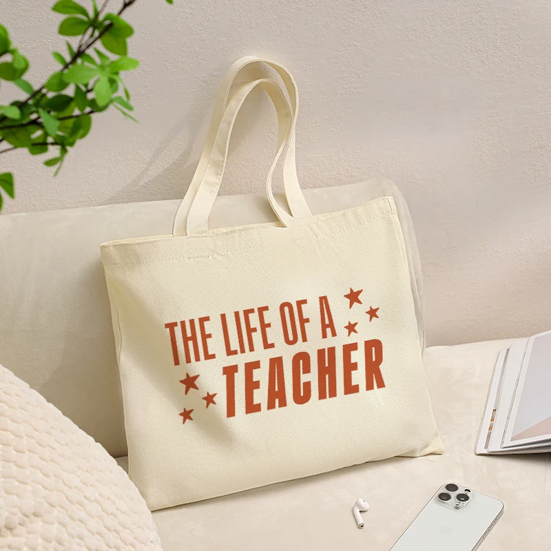 Teacher Life Quote Star Print Canvas Tote Bag Back to School Gift Reusable Casual Shoulder Bag
Teacher Life Quote Star Print Canvas Tote Bag Back to School Gift Reusable Casual Shoulder Bag
