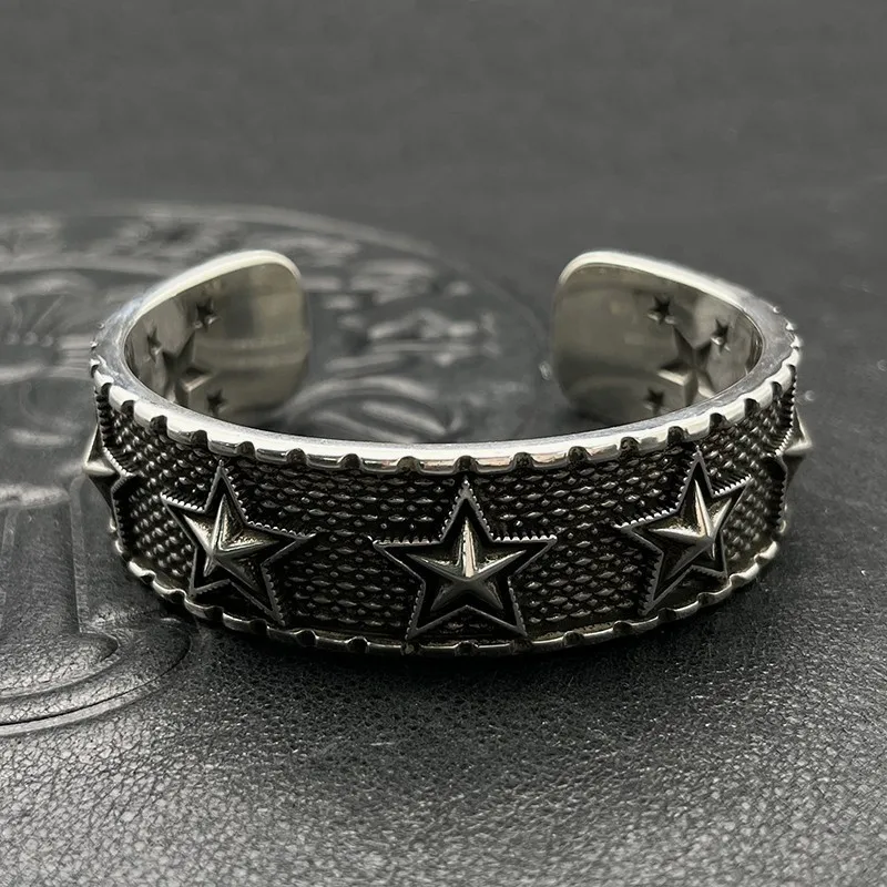 S925 sterling silver trendy retro tooth mark wide version star opening bracelet five-pointed star niche men's and women'sjewelry
S925 sterling silver trendy retro tooth mark wide version star opening bracelet five-pointed star niche men's and women'sjewelry