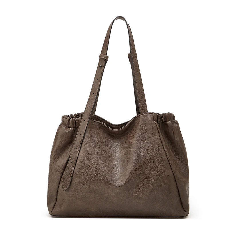 Retro heavy technology double handle large capacity tote bag, simple and durable PU leather shopping storage bag
Retro heavy technology double handle large capacity tote bag, simple and durable PU leather shopping storage bag