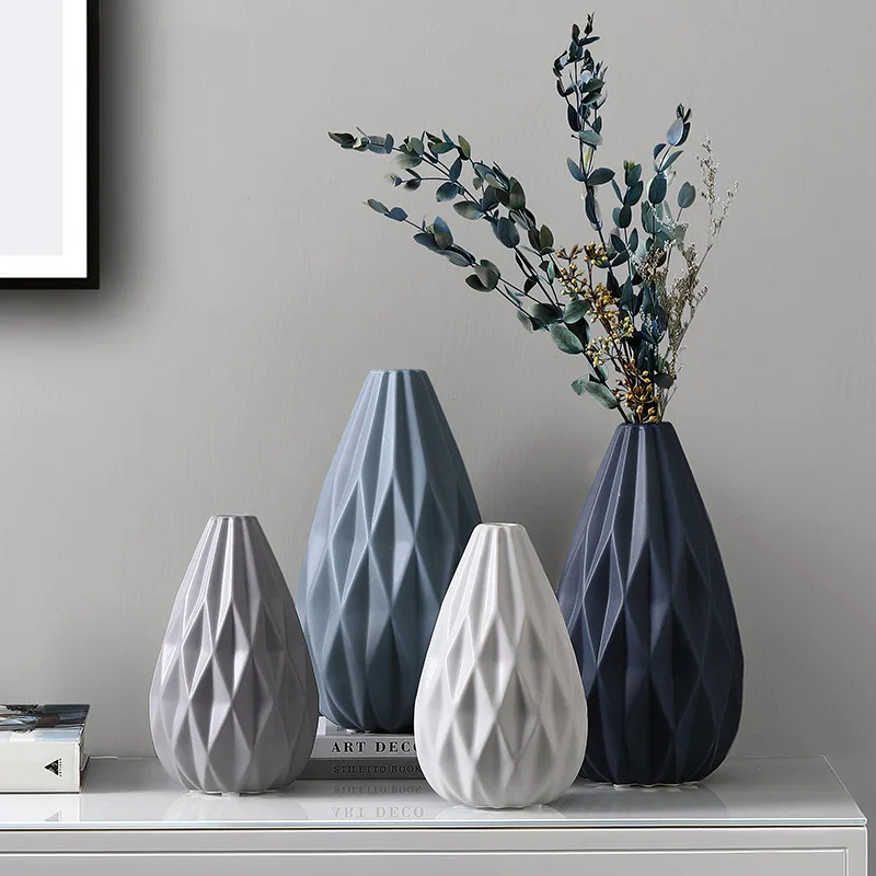 Nordic geometric ceramic vase ornaments, flower arrangements, modern minimalist creativity, living room, dining table, home deco
Nordic geometric ceramic vase ornaments, flower arrangements, modern minimalist creativity, living room, dining table, home deco