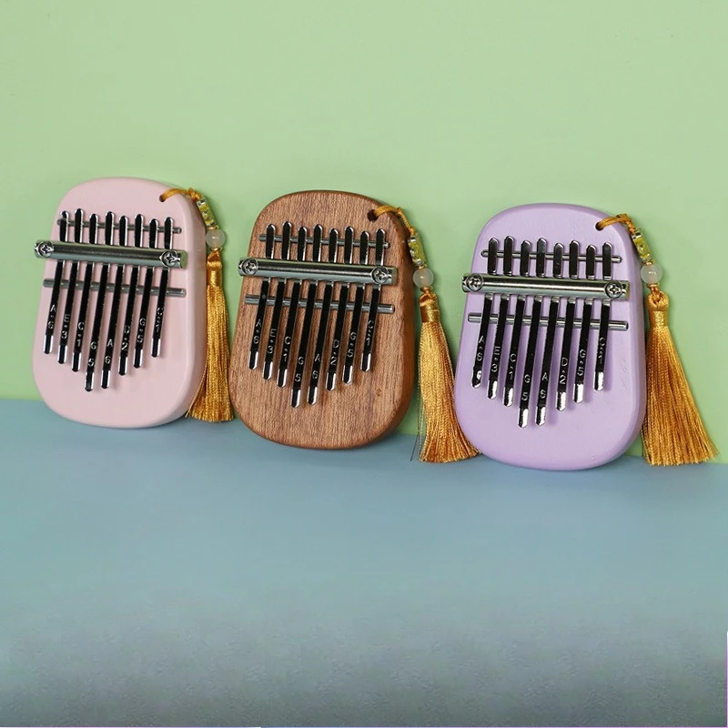 Medium 8 MINI Thumb Piano Kalimba Kalimba Mini Finger Piano Kabbaleen Beginner Portable Instrument
Medium 8 MINI Thumb Piano Kalimba Kalimba Mini Finger Piano Kabbaleen Beginner Portable Instrument