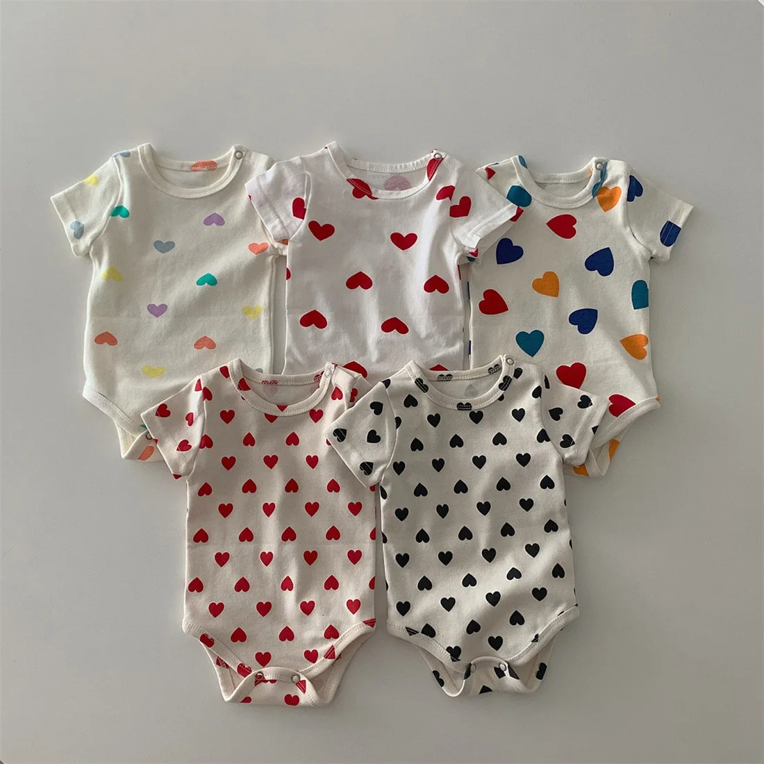 Korean Style Fashion Cotton Cartoon Love Print Baby Romper Short Sleeve O Neck Casual Button White Infant Kids Rompers 2023
Korean Style Fashion Cotton Cartoon Love Print Baby Romper Short Sleeve O Neck Casual Button White Infant Kids Rompers 2023
