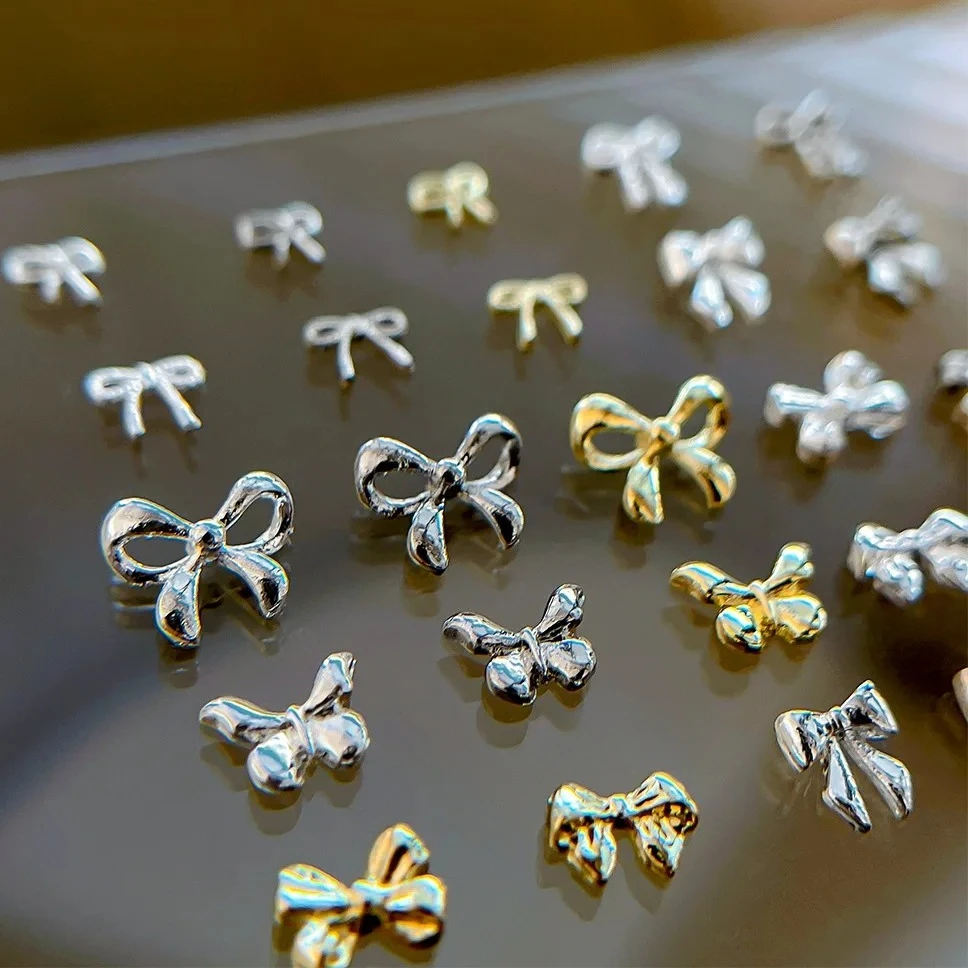 Gold Silver Metal Mini Cute Bowknot Butterfly French Alloy Ribbon Lovely Bow Tie Nail Art Decoration Charms Manicure Accessories
Gold Silver Metal Mini Cute Bowknot Butterfly French Alloy Ribbon Lovely Bow Tie Nail Art Decoration Charms Manicure Accessories