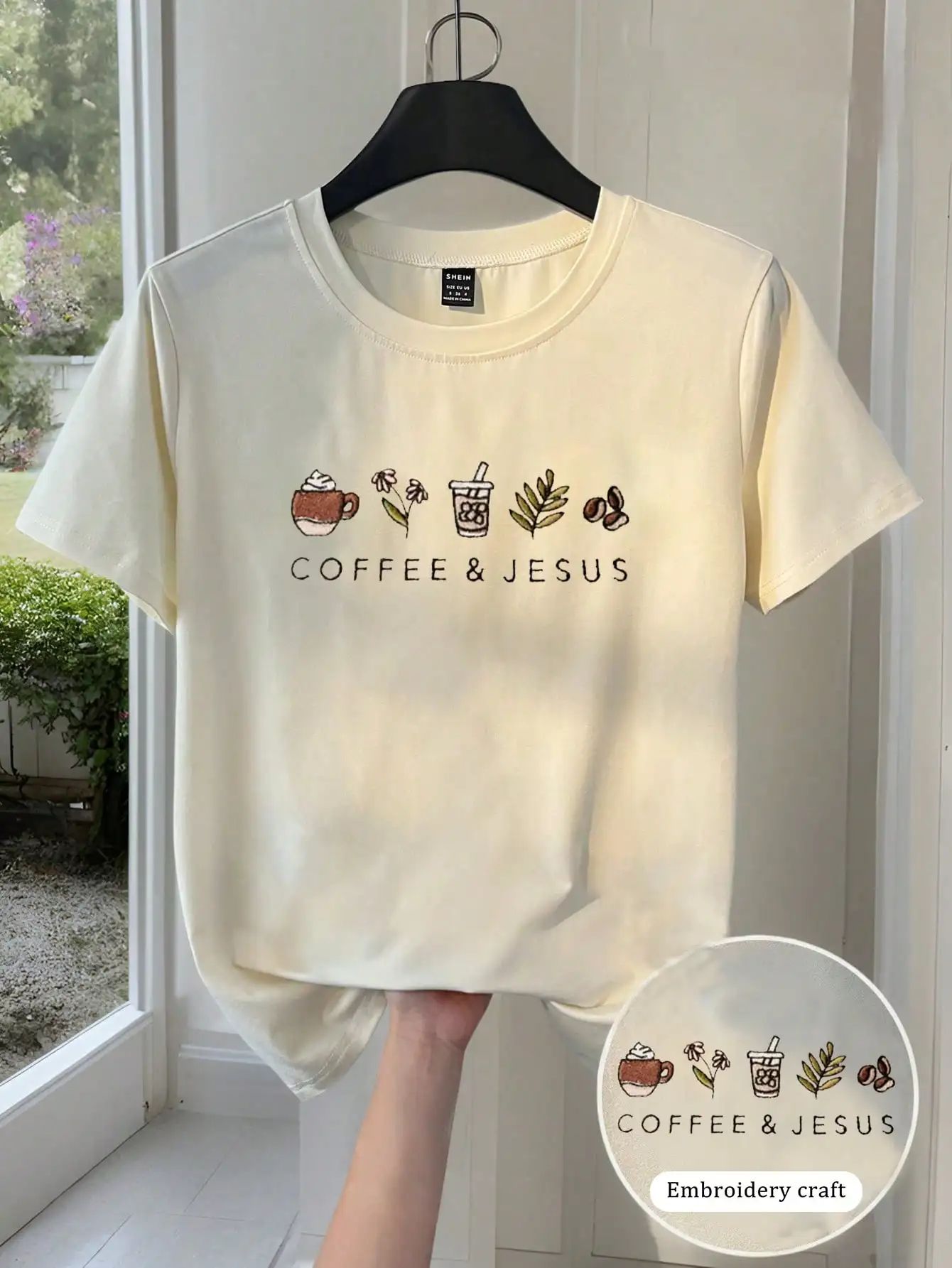 Coffee & Jesus Embroidery Graphic T-Shirt for Women, Round Neck Casual Tee with Floral and Coffee Bean Design
Coffee & Jesus Embroidery Graphic T-Shirt for Women, Round Neck Casual Tee with Floral and Coffee Bean Design