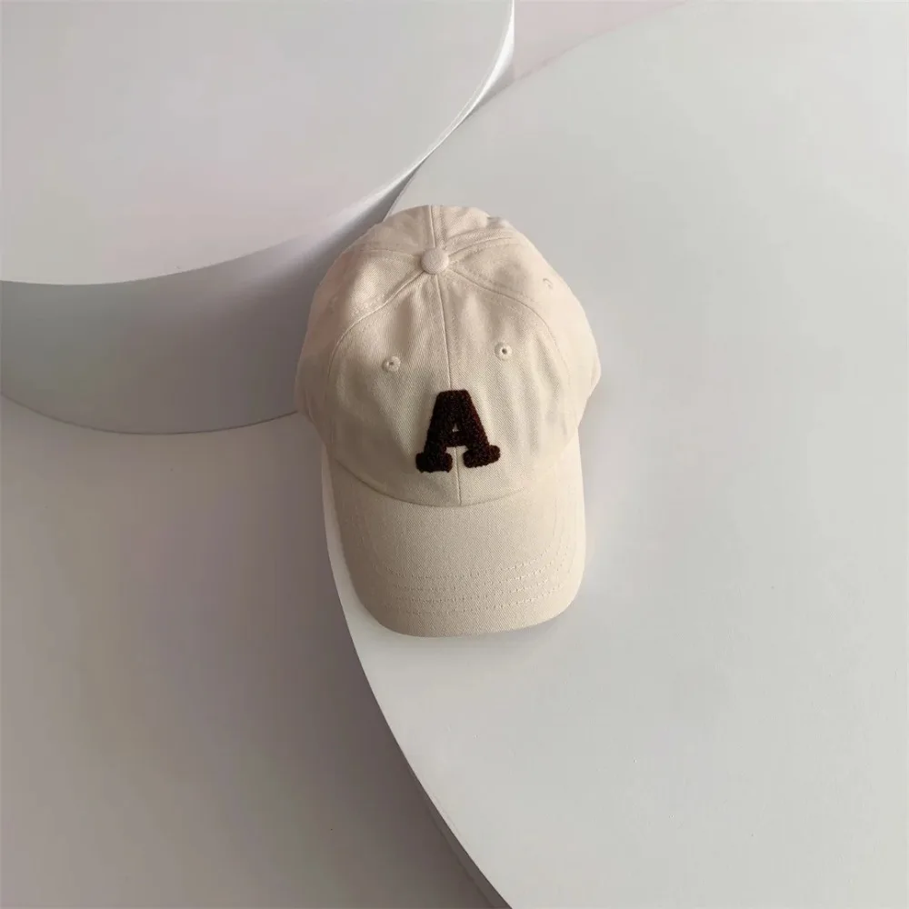 Модная детская бейсболка с вышивкой букв, летняя однотонная шляпа Snapback от солнца, повседневная спортивная регулируемая фуражка для мальчиков и девочек
Модная детская бейсболка с вышивкой букв, летняя однотонная шляпа Snapback от солнца, повседневная спортивная регулируемая фуражка для мальчиков и девочек