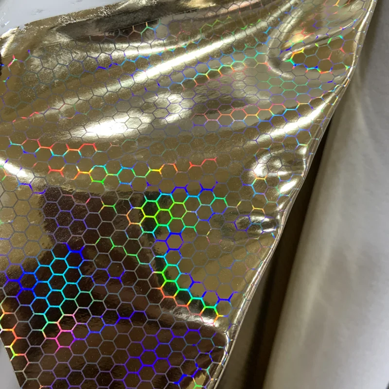 Hexagon Holographic Decorative Mirror Pattern Pu Synthetic Leather Materials
Hexagon Holographic Decorative Mirror Pattern Pu Synthetic Leather Materials