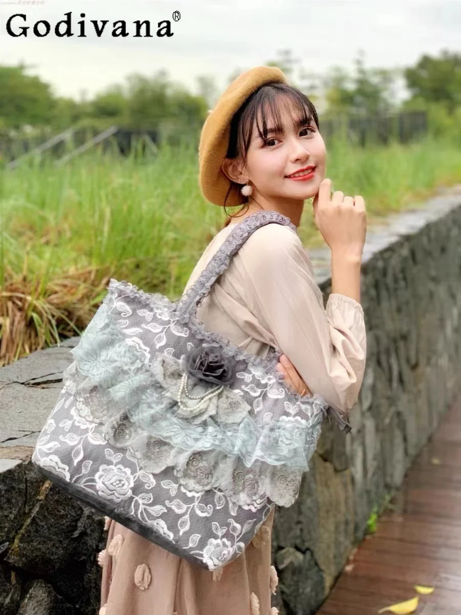 Japanese original retro elegant lady Lolita lace flower handbag court princess style daily commute large capacity tote bag
Japanese original retro elegant lady Lolita lace flower handbag court princess style daily commute large capacity tote bag