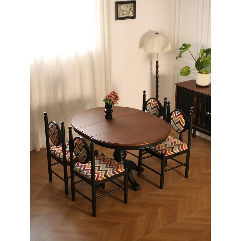 Solid wood retractable dining table variable round table household small apartment 1.3m oval dining table and chairs
Solid wood retractable dining table variable round table household small apartment 1.3m oval dining table and chairs