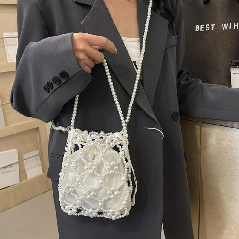 Sense of Luxury White Beading Bucket Shoulder and Crossbody Bags Exquisite Fresh Party Handbags for Women 2024 Fashion on Sale
Sense of Luxury White Beading Bucket Shoulder and Crossbody Bags Exquisite Fresh Party Handbags for Women 2024 Fashion on Sale