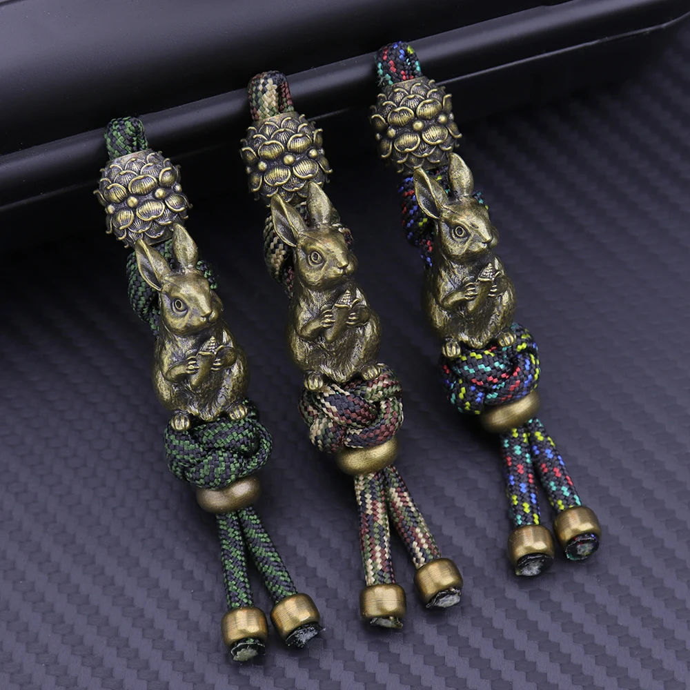 Кролик EDC зонтик веревка толкающий кулон портативный кулон нож ретро латунный кулон ручной работы декомпрессионная настольная игрушка
Кролик EDC зонтик веревка толкающий кулон портативный кулон нож ретро латунный кулон ручной работы декомпрессионная настольная игрушка