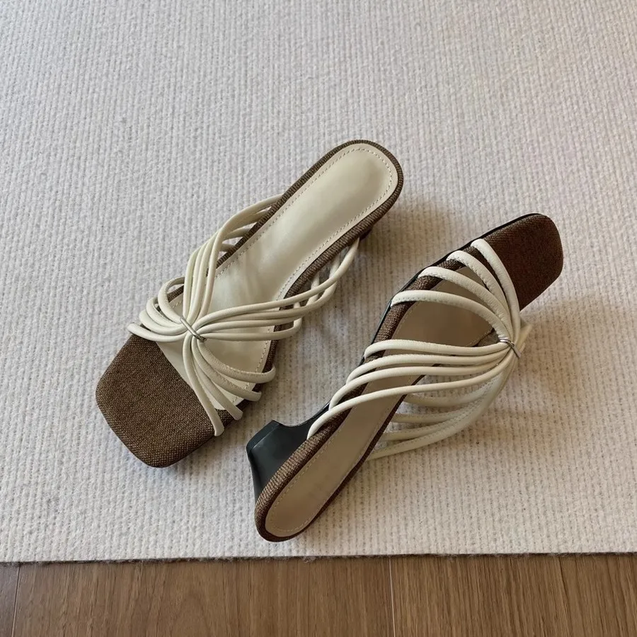 French woven word with holiday style thick heel cool slippers women's square head temperament retro slippers
French woven word with holiday style thick heel cool slippers women's square head temperament retro slippers