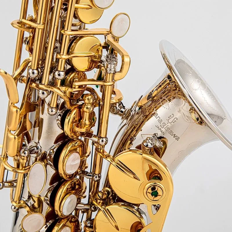 Альт-саксофон японского производства B ♭ альт-саксофон, маленькая изогнутая шея, альт-саксофон, никелированные золотые клавиши, латунный материал, выступление
Альт-саксофон японского производства B ♭ альт-саксофон, маленькая изогнутая шея, альт-саксофон, никелированные золотые клавиши, латунный материал, выступление