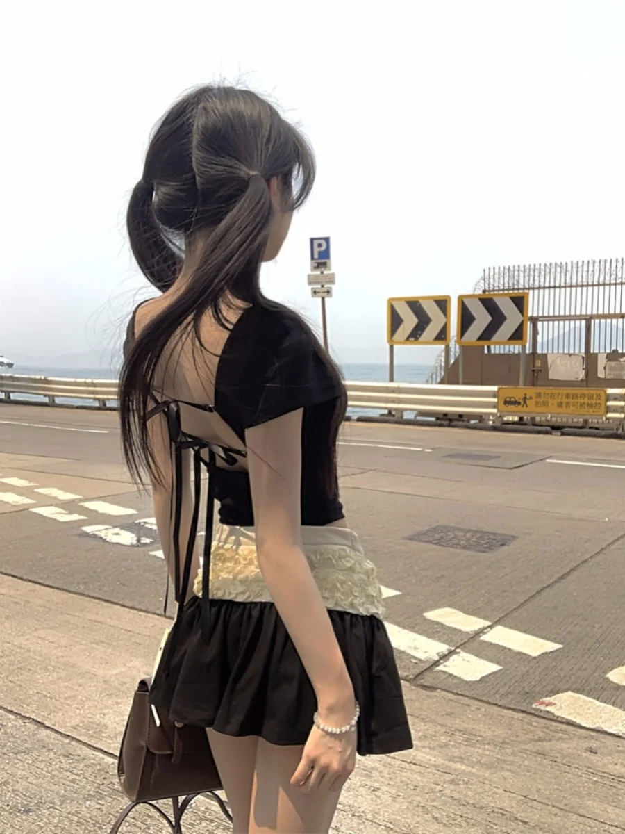 Black Belted Backless round Neck Short Sleeve T-Shirt Summer Illusory Two-Piece Design Slim Fit Pleated Short Skirt Set
Black Belted Backless round Neck Short Sleeve T-Shirt Summer Illusory Two-Piece Design Slim Fit Pleated Short Skirt Set
