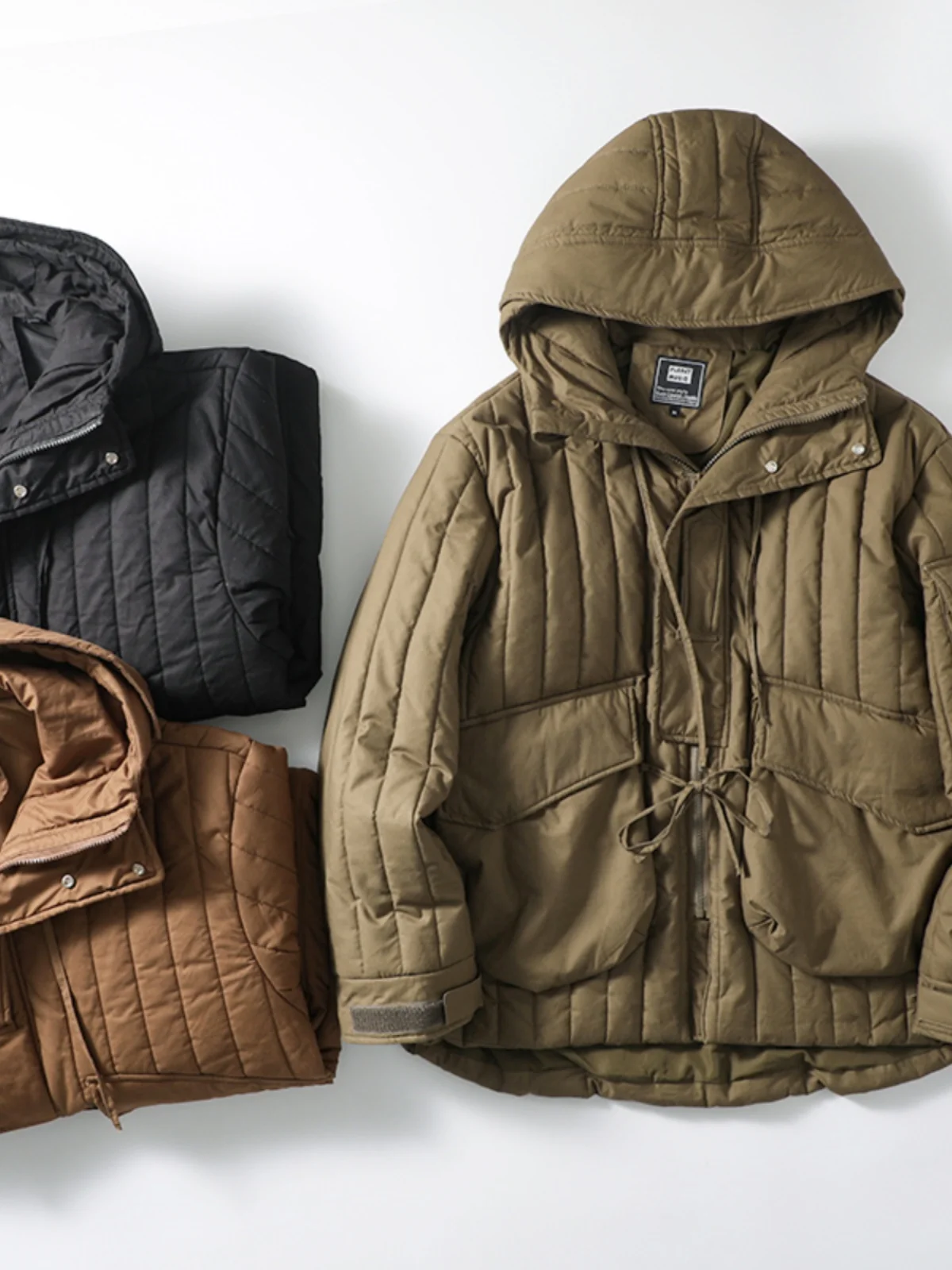 Мужская повседневная куртка в японском ретро-стиле с капюшоном, теплая хлопковая куртка с большими карманами, модная городская модель приталенного кроя
Мужская повседневная куртка в японском ретро-стиле с капюшоном, теплая хлопковая куртка с большими карманами, модная городская модель приталенного кроя