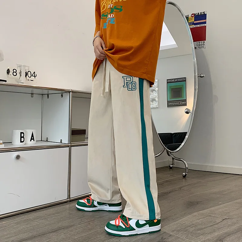 Pants Men's Spring Korean Fashion Leisure Sports Port Style INS Student Versatile Drawstring Straight Tube Floor Dragging Pants
Pants Men's Spring Korean Fashion Leisure Sports Port Style INS Student Versatile Drawstring Straight Tube Floor Dragging Pants