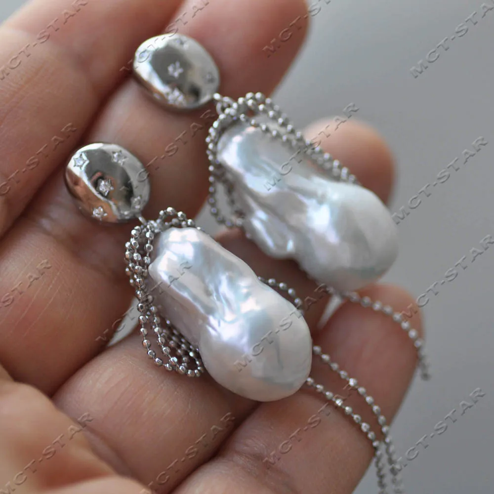 MTC·STAR Round Bead Tassel Style 25mm White Baroque Teardrop Keshi Reborn Pearl CZ Dangle Earring (Z14558)
MTC·STAR Round Bead Tassel Style 25mm White Baroque Teardrop Keshi Reborn Pearl CZ Dangle Earring (Z14558)