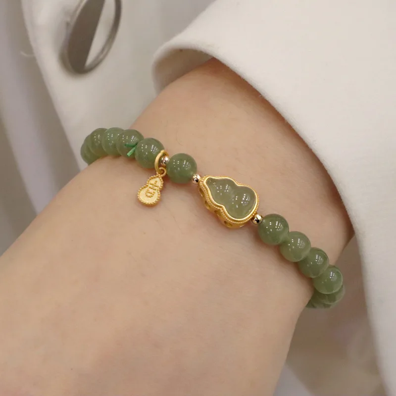 Natural Hetian Light Blue Jade Bracelet with 925 Silver Gold-Plated Auspicious Tag & Gold-Inlaid Jade Gourd, Unisex Gift
Natural Hetian Light Blue Jade Bracelet with 925 Silver Gold-Plated Auspicious Tag & Gold-Inlaid Jade Gourd, Unisex Gift