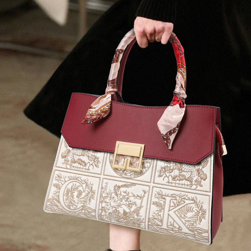 Aidrani Elegant Embroidered Tote: Two - Tone Charm, Scarf Accent & Brand Sophistication
Aidrani Elegant Embroidered Tote: Two - Tone Charm, Scarf Accent & Brand Sophistication