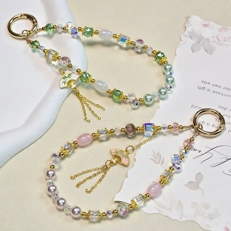 Retro Chinese tassel phone chain, short wrist portable crystal beaded hanging accessory
Retro Chinese tassel phone chain, short wrist portable crystal beaded hanging accessory