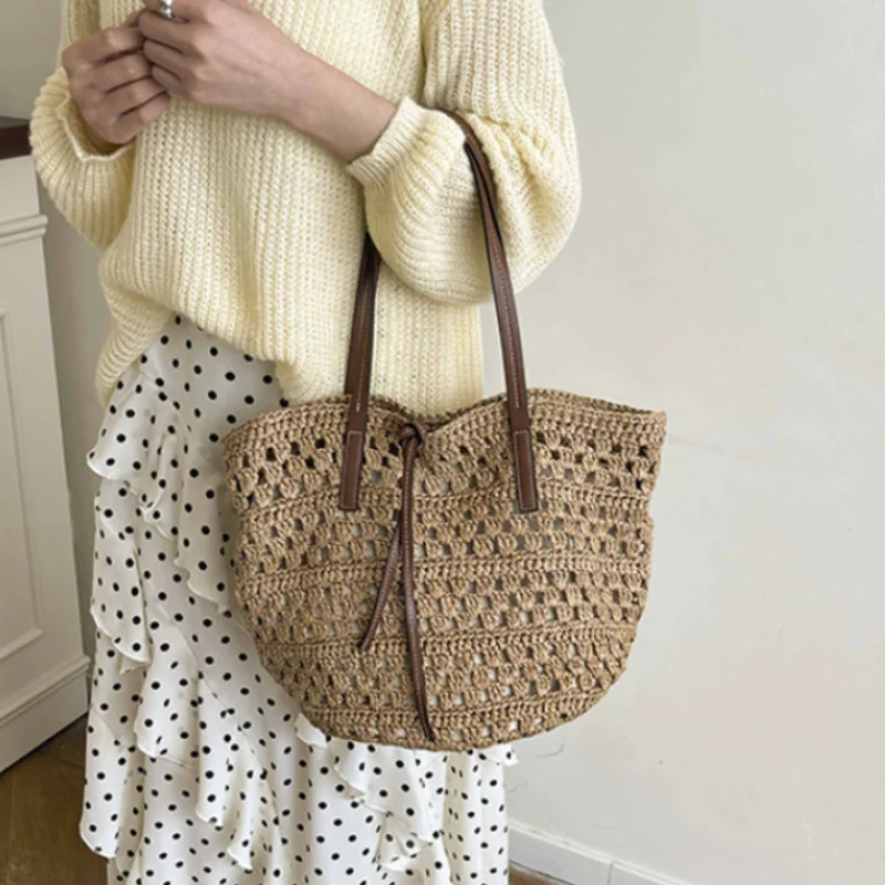 Woven Hollowed Tote Bag Lazy Style Large Capacity Shoulder Bag Women Stylish Versatile Beach Vacation Bag Handmade Straw Handbag
Woven Hollowed Tote Bag Lazy Style Large Capacity Shoulder Bag Women Stylish Versatile Beach Vacation Bag Handmade Straw Handbag
