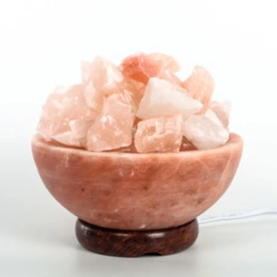 Himalayan Salt Bowl with Chunks on Wooden Base.
Himalayan Salt Bowl with Chunks on Wooden Base.