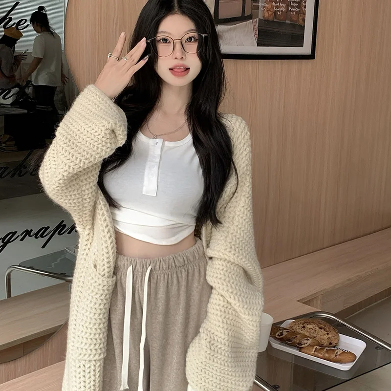 Длинные кардиганы для офиса, женские, летние, повседневные, элегантные, свободного кроя, с бантом, вязаные, с V-образным вырезом, с карманами, на пуговицах спереди, удлиненные, из модала, для молодых женщин
Длинные кардиганы для офиса, женские, летние, повседневные, элегантные, свободного кроя, с бантом, вязаные, с V-образным вырезом, с карманами, на пуговицах спереди, удлиненные, из модала, для молодых женщин