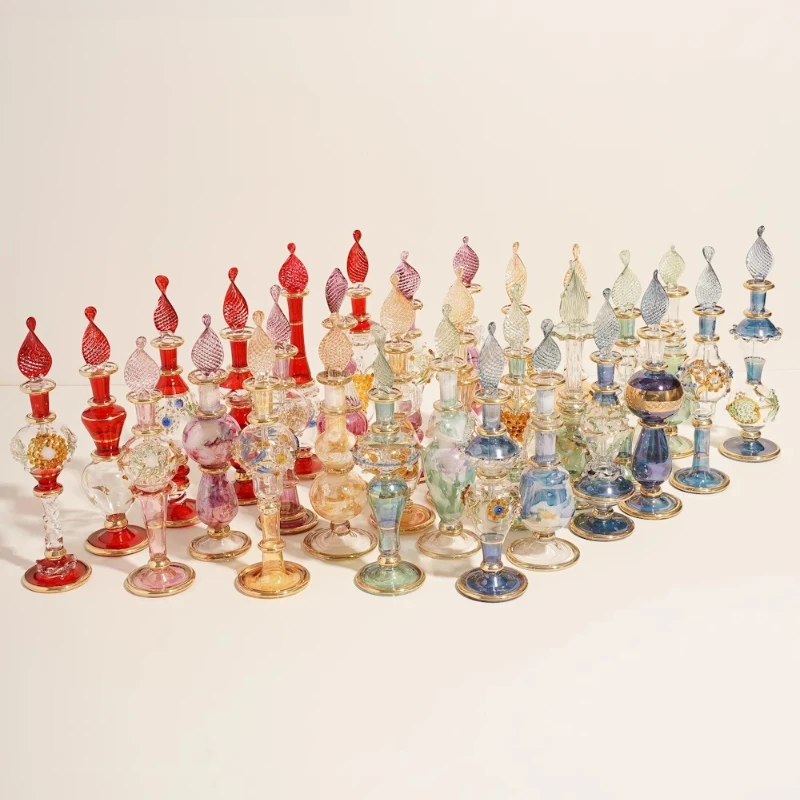 Egyptian Traditional Handicrafts Dipping Mini Handmade Glass Perfume Bottle Gift
Egyptian Traditional Handicrafts Dipping Mini Handmade Glass Perfume Bottle Gift