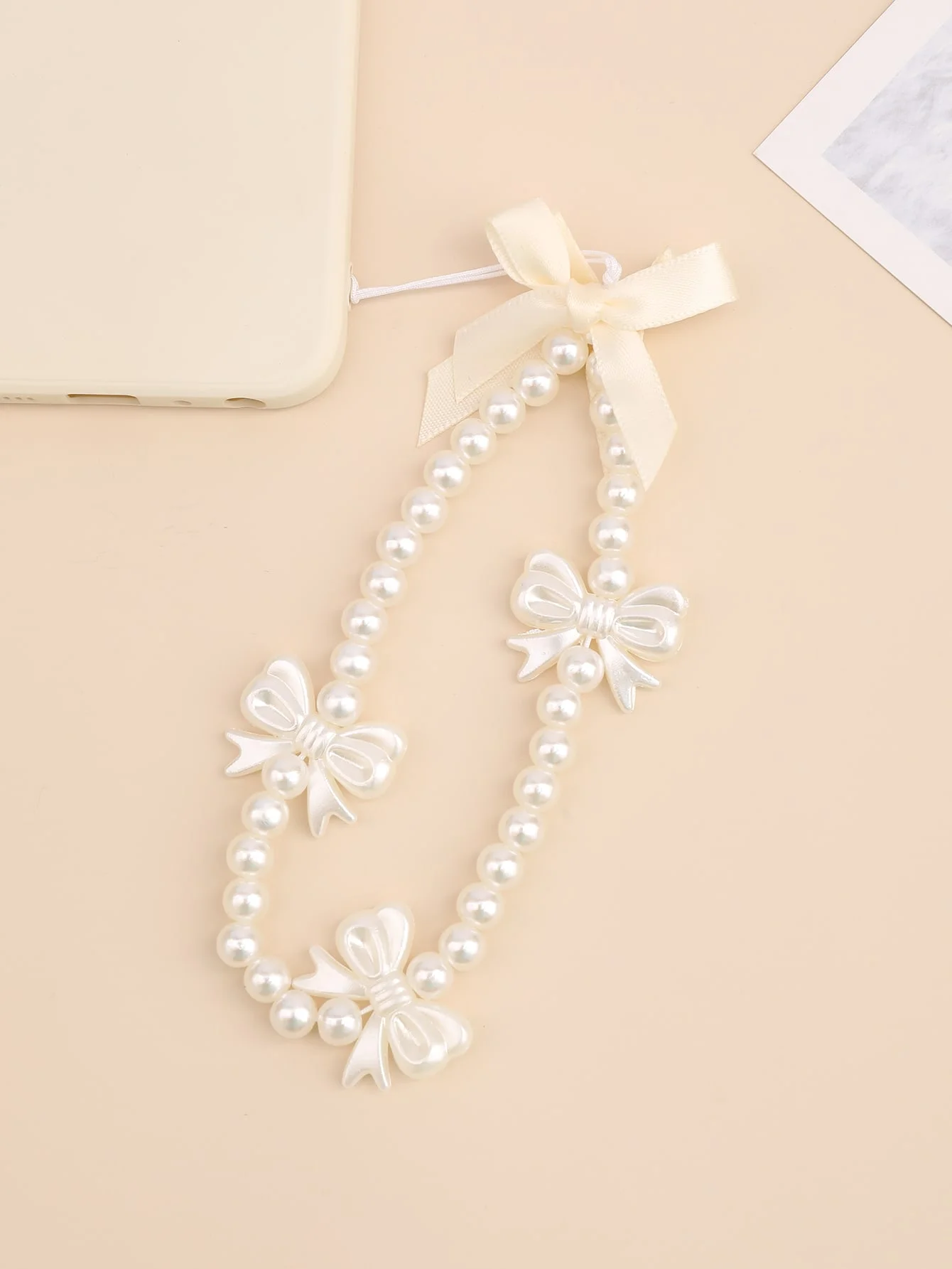 Yilian New Girl Heart Pearl Bow Phone Hanging Rope Handmade Beaded Phone Chain Short USB Pendant for Women
Yilian New Girl Heart Pearl Bow Phone Hanging Rope Handmade Beaded Phone Chain Short USB Pendant for Women