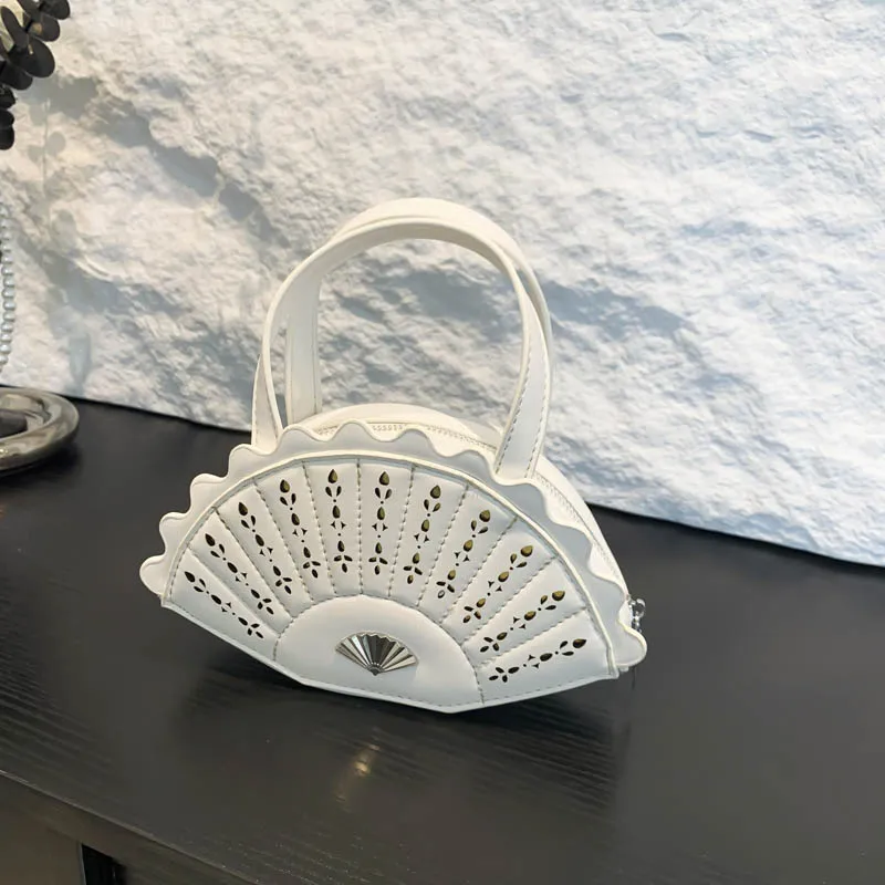 Personality Fan Shape Hollow Out PU Handbags Solid Zipper Super Cool Hot Trendy Stylish Design Women's Handbags 2025 Fashion New
Personality Fan Shape Hollow Out PU Handbags Solid Zipper Super Cool Hot Trendy Stylish Design Women's Handbags 2025 Fashion New