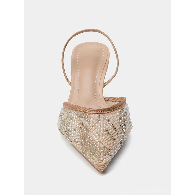 Летние роскошные туфли-мюли для женщин, модные босоножки на высоком каблуке с бусинами, остроносые туфли с ремешком на пятке, элегантная свадебная обувь для дам
Летние роскошные туфли-мюли для женщин, модные босоножки на высоком каблуке с бусинами, остроносые туфли с ремешком на пятке, элегантная свадебная обувь для дам