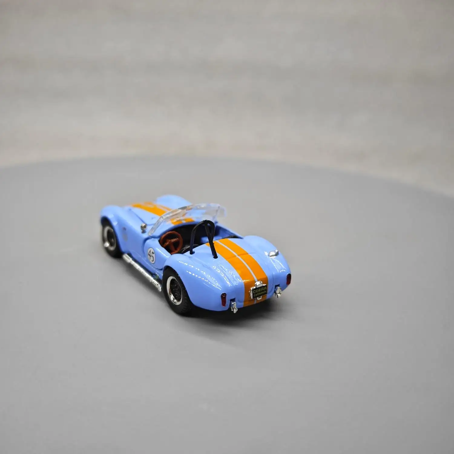 ACME 1:64 SHELBY COBRA Shelby Cobra 427 S/C # 45 Sky Blue SC-705-45 Advanced Collection Ornament Car Models
ACME 1:64 SHELBY COBRA Shelby Cobra 427 S/C # 45 Sky Blue SC-705-45 Advanced Collection Ornament Car Models