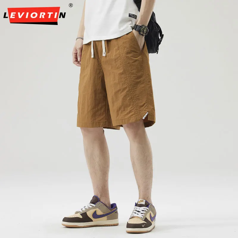 Men's Streetwear Summer Casual Shorts Lightweight Ice Silk Quick-Dry Loose Fit Mid-Length Breathable Elastic Wais Sports Shorts
Men's Streetwear Summer Casual Shorts Lightweight Ice Silk Quick-Dry Loose Fit Mid-Length Breathable Elastic Wais Sports Shorts