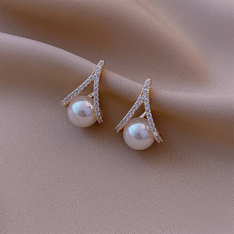 925 silver needle fashion temperament Pearl Earrings geometric trend design sense earrings French simple ear accessories
925 silver needle fashion temperament Pearl Earrings geometric trend design sense earrings French simple ear accessories