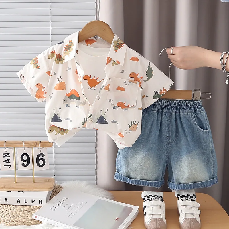 Baby Boys Suit Korean Fashion Summer Clothes Cartoon Dinosaur Print Shirt + Short Sleeve T-shirt + Denim Shorts Three Piece Set
Baby Boys Suit Korean Fashion Summer Clothes Cartoon Dinosaur Print Shirt + Short Sleeve T-shirt + Denim Shorts Three Piece Set