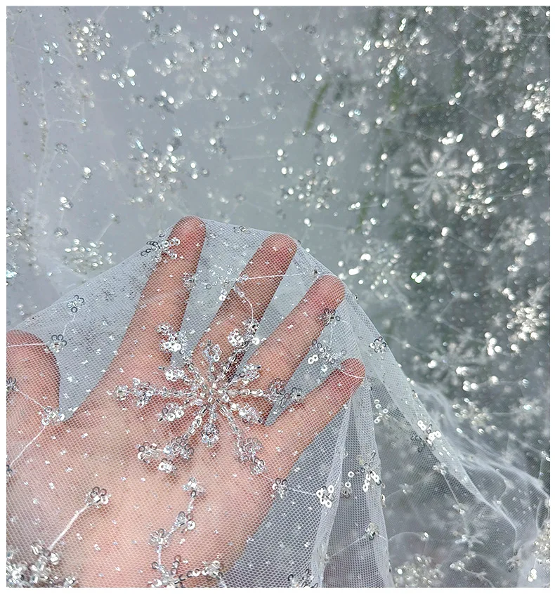 New sparkling snowflake sequin embroidered mesh fabric for women's children's clothing,designer fabrics, DIY sewing accessories
New sparkling snowflake sequin embroidered mesh fabric for women's children's clothing,designer fabrics, DIY sewing accessories
