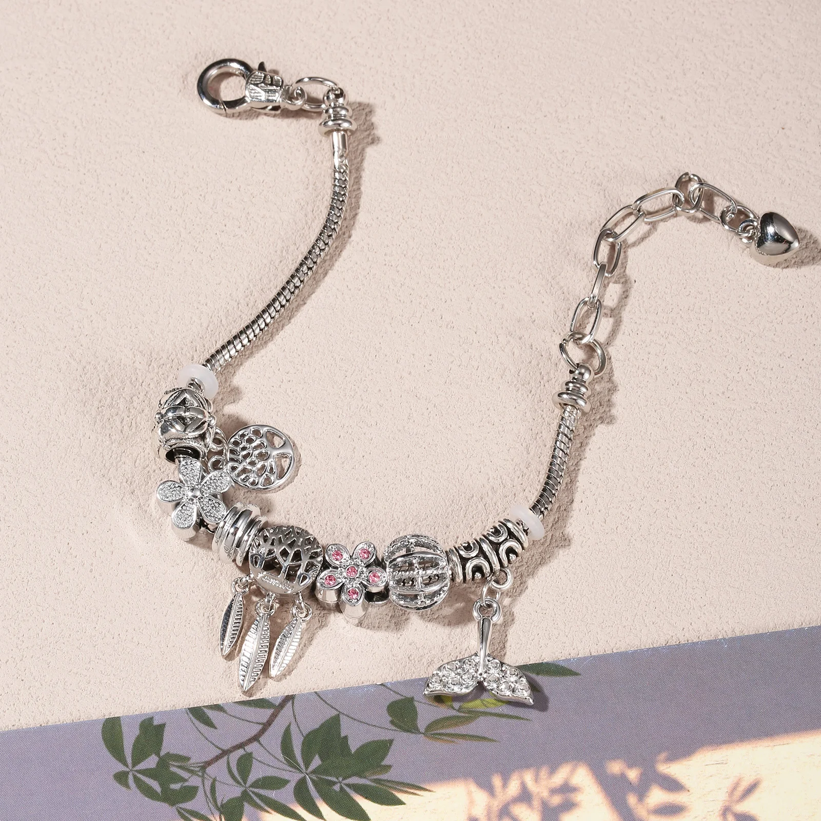 Silvery Stainless Steel Charm Bracelet with Life Tree Dreamcatcher and Mermaid Tail Pendants for Women
Silvery Stainless Steel Charm Bracelet with Life Tree Dreamcatcher and Mermaid Tail Pendants for Women
