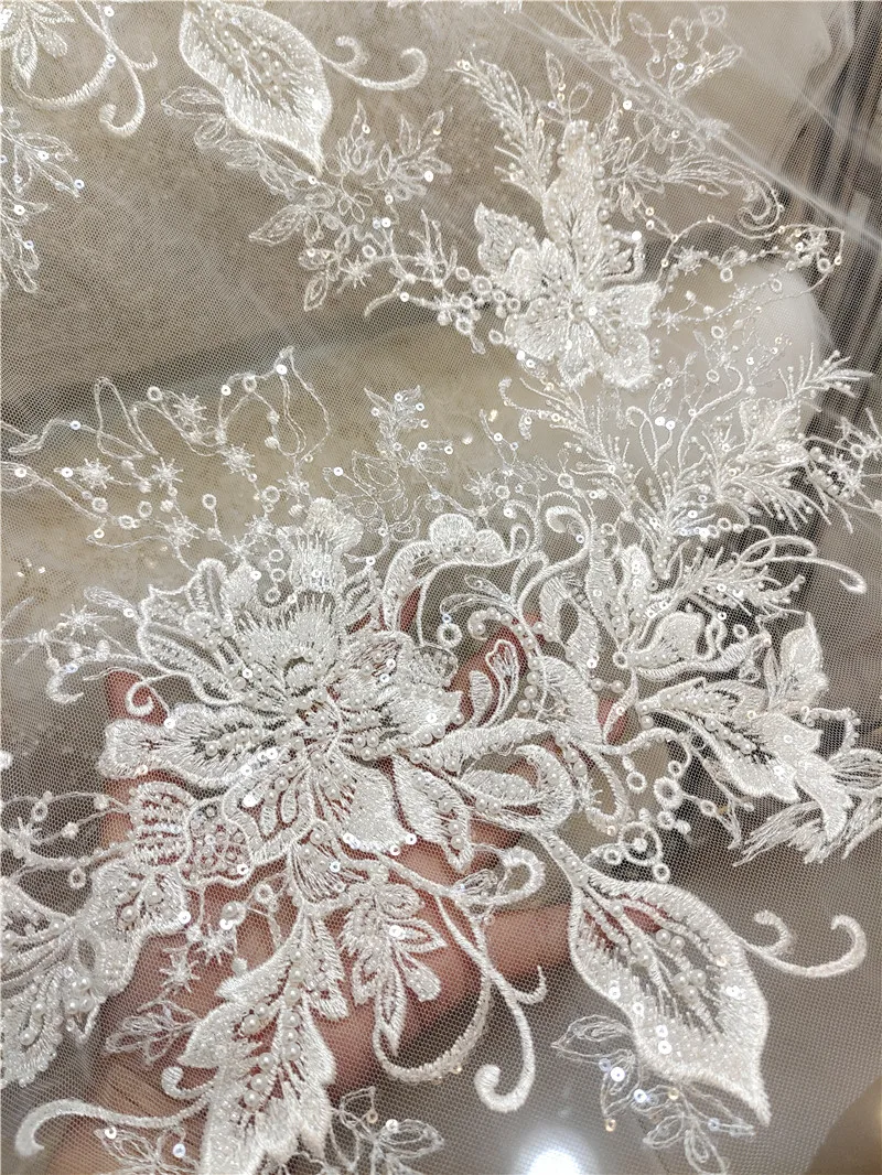 Тяжелая вышитая бисером кружевная ткань цвета экрю, свадебный фатин с пайетками, для вуалей, штор, поделок своими руками, декоративный вышитый материал
Тяжелая вышитая бисером кружевная ткань цвета экрю, свадебный фатин с пайетками, для вуалей, штор, поделок своими руками, декоративный вышитый материал