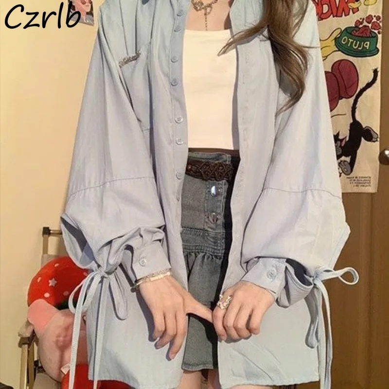 Однотонная рубашка женская, весенняя, с длинным рукавом, на шнуровке, свободная однобортная, простая, в корейском стиле, универсальная, тонкая, милая, модная, уютная
Однотонная рубашка женская, весенняя, с длинным рукавом, на шнуровке, свободная однобортная, простая, в корейском стиле, универсальная, тонкая, милая, модная, уютная