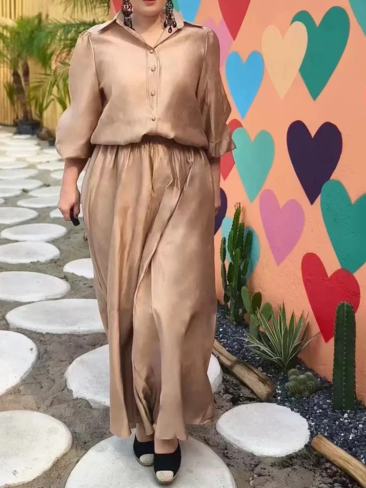 Temperament lapel long sleeve solid color loose shirt Spring women's new two-piece high waist A-shaped skirt casual suit
Temperament lapel long sleeve solid color loose shirt Spring women's new two-piece high waist A-shaped skirt casual suit