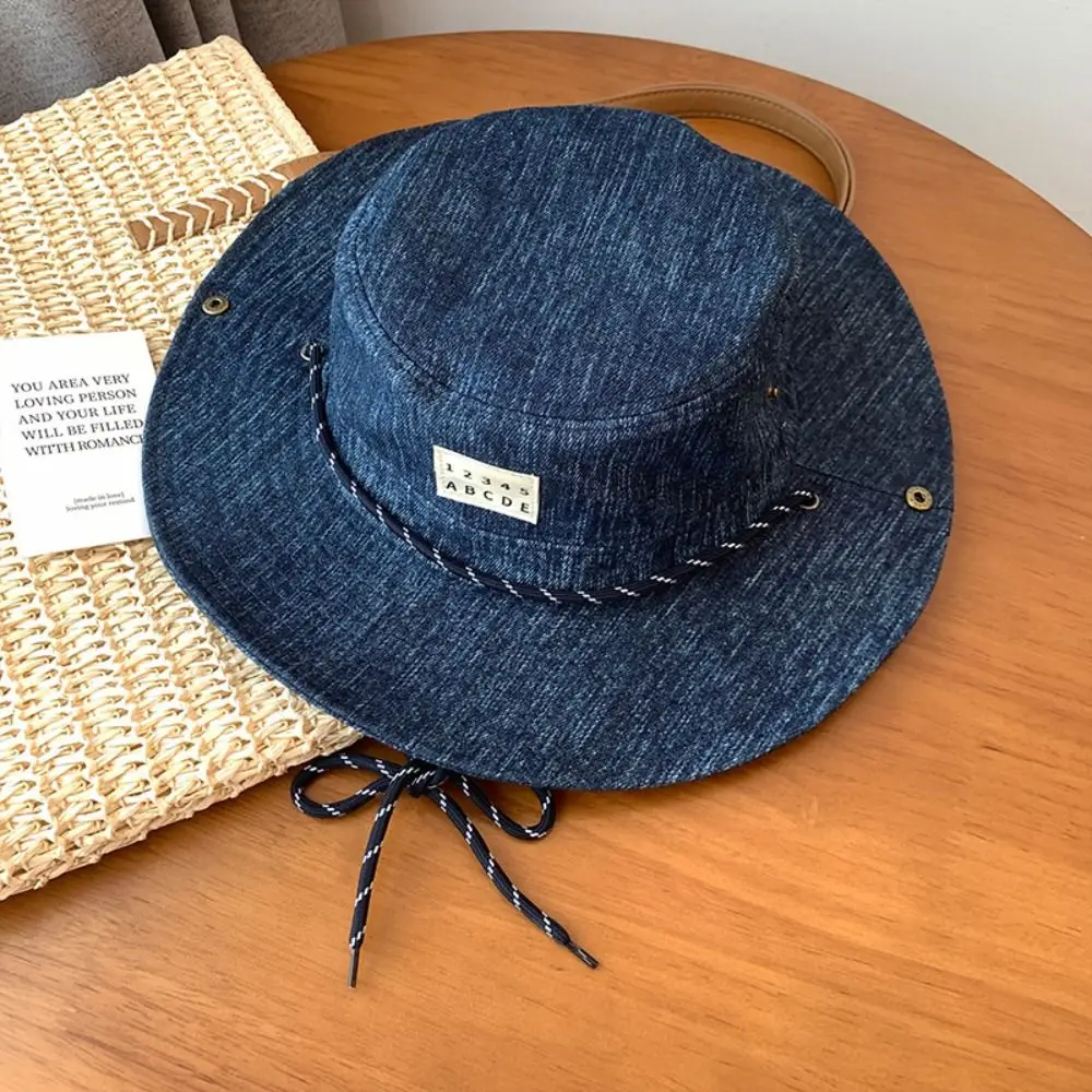 American Alphabet Vintage Washed Denim Hat Wide Brim Drawstring Adjustable Western Cowboy Hats Windproof Sunscreen Fisherman Hat
American Alphabet Vintage Washed Denim Hat Wide Brim Drawstring Adjustable Western Cowboy Hats Windproof Sunscreen Fisherman Hat