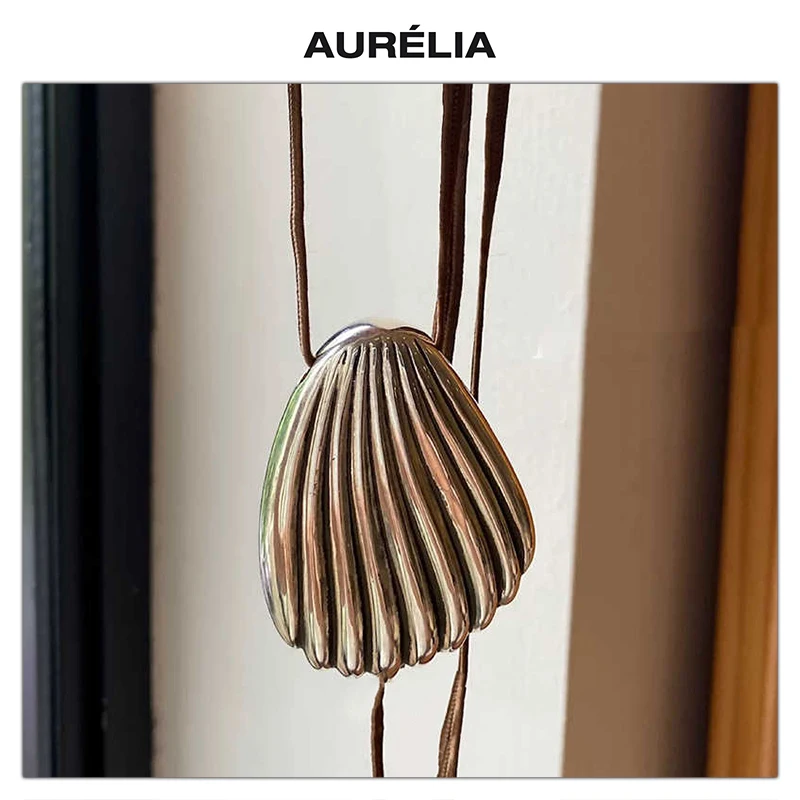2025 New Fashion Silver Shell Brown Drawstring Long Necklace Sweater Chain Woman Popular Jewelry Accessory Trend
2025 New Fashion Silver Shell Brown Drawstring Long Necklace Sweater Chain Woman Popular Jewelry Accessory Trend