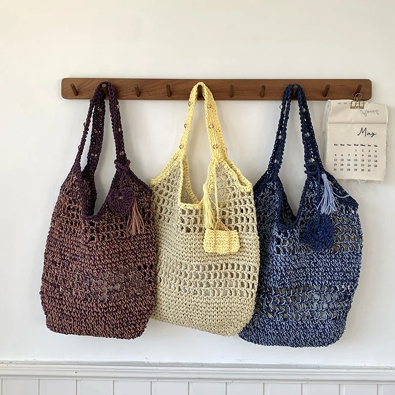 Весенне-летняя полая тканая сумка, женская чистая ручная работа, бумажная веревочная сетка, пляжная соломенная тканая сумка для отдыха, нишевая сумка на одно плечо 
Весенне-летняя полая тканая сумка, женская чистая ручная работа, бумажная веревочная сетка, пляжная соломенная тканая сумка для отдыха, нишевая сумка на одно плечо