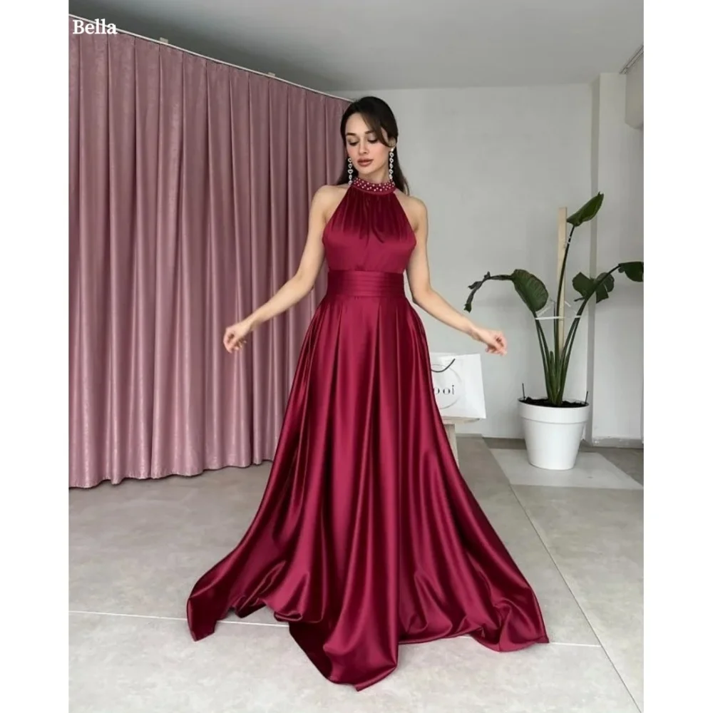 Bella Customized Halter Neck Backless robes de soirée Satin A-line Glitter Party Dresses Floor-Length Trailing Prom Dress 2025
Bella Customized Halter Neck Backless robes de soirée Satin A-line Glitter Party Dresses Floor-Length Trailing Prom Dress 2025
