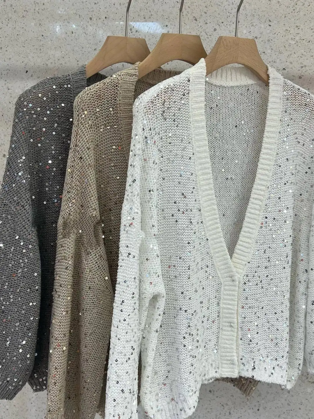 V-neck loose and versatile short jacket hollowed out top sequined knit cardigan women's versatile
V-neck loose and versatile short jacket hollowed out top sequined knit cardigan women's versatile
